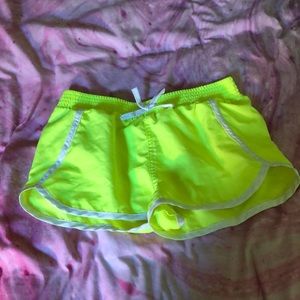 Neon yellow swim shorts